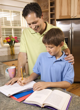 Child with father doing homework